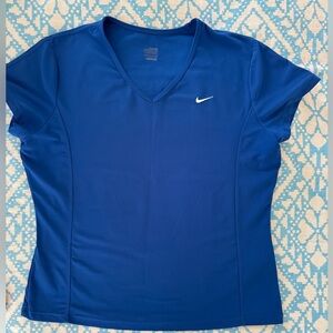 Nike Dry Fit tennis top. Size L-XL. Fits like a large. Poly spandex.